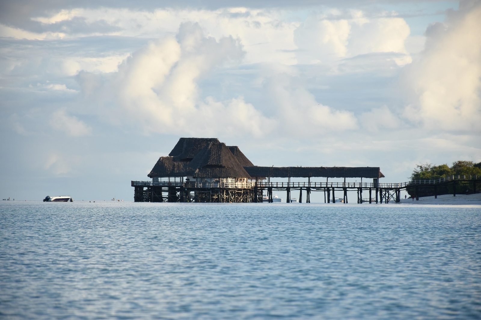 Thatched stilt restaurant over the ocean in Zanzibar